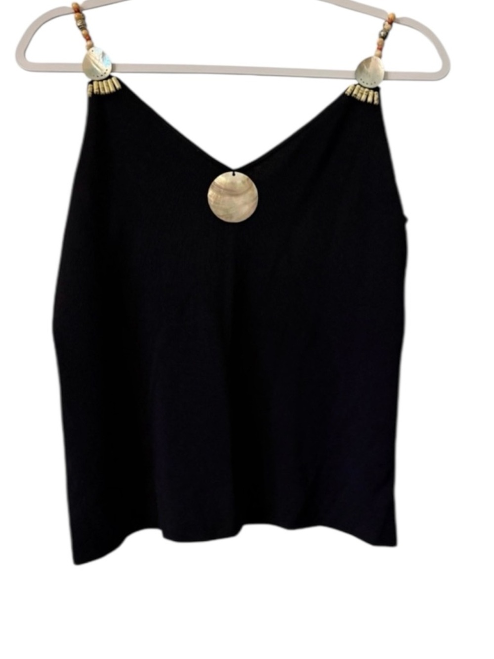 Ziani Couture women’s Medium sleeveless v-neck black top with a front medallion